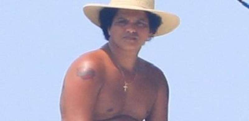 Bruno Mars with his girlfriend Jessica Caban are visiting Punta de Mita