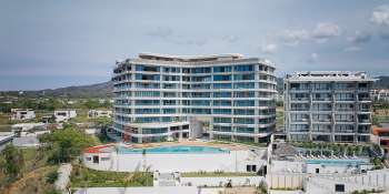 Architectural rendering of Crystal Cove beachfront condominiums in La Cruz de Huanacaxtle, Riviera Nayarit