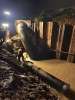 SEAPAL crews repair a large water pipeline in an excavated work area at night in Puerto Vallarta.