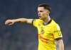 Álvaro Fidalgo playing in a yellow football kit